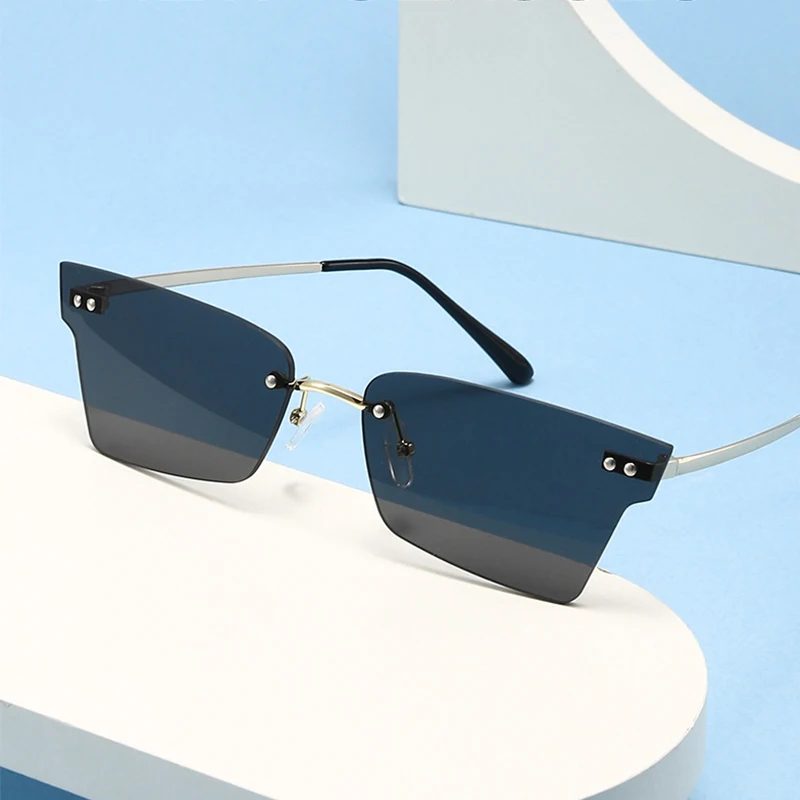 New Rimless Sunglasses For Men Women Fashion Outdoor Sun Glasses Designer Special-shaped Summer Style Party Wedding Accessory
New Rimless Sunglasses For Men Women Fashion Outdoor Sun Glasses Designer Special-shaped Summer Style Party Wedding Accessory