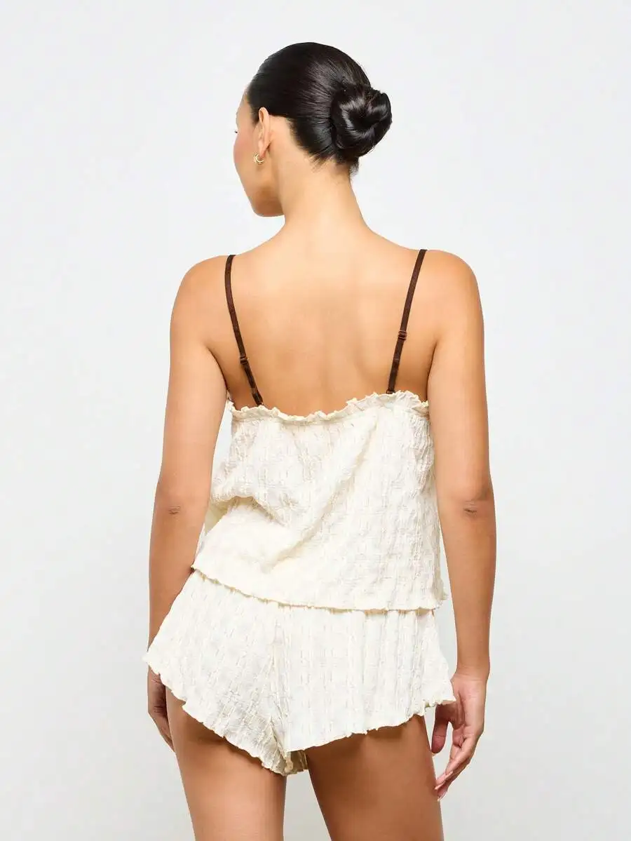 Textured Cami Top And Shorts Pajama Set Summer Sleepwear With Ruffled Edge
Textured Cami Top And Shorts Pajama Set Summer Sleepwear With Ruffled Edge