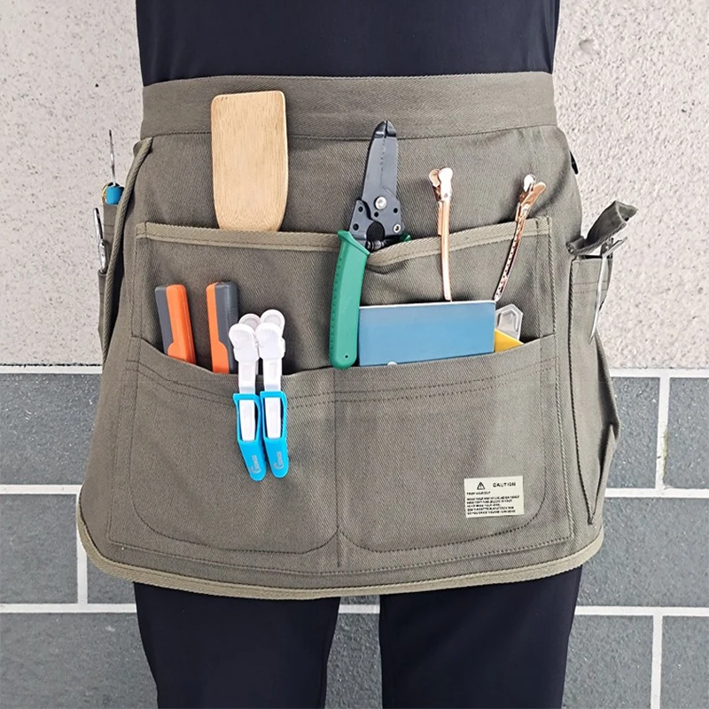 New Half Body Apron Canvas Multi Pocket Short Waist Gardening Barber Tool Apron Storage Waist Bag Hardware Tool Storage Apron
New Half Body Apron Canvas Multi Pocket Short Waist Gardening Barber Tool Apron Storage Waist Bag Hardware Tool Storage Apron