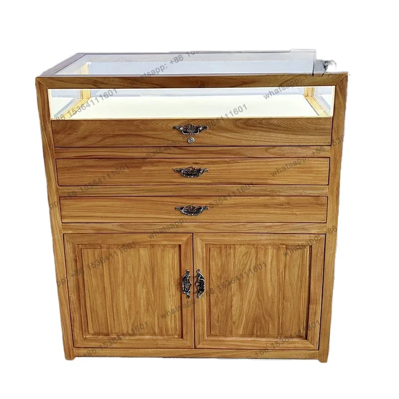 Solid wood jewelry counter log gold and silver container glass cabinet jade storage display cabinet customization
Solid wood jewelry counter log gold and silver container glass cabinet jade storage display cabinet customization
