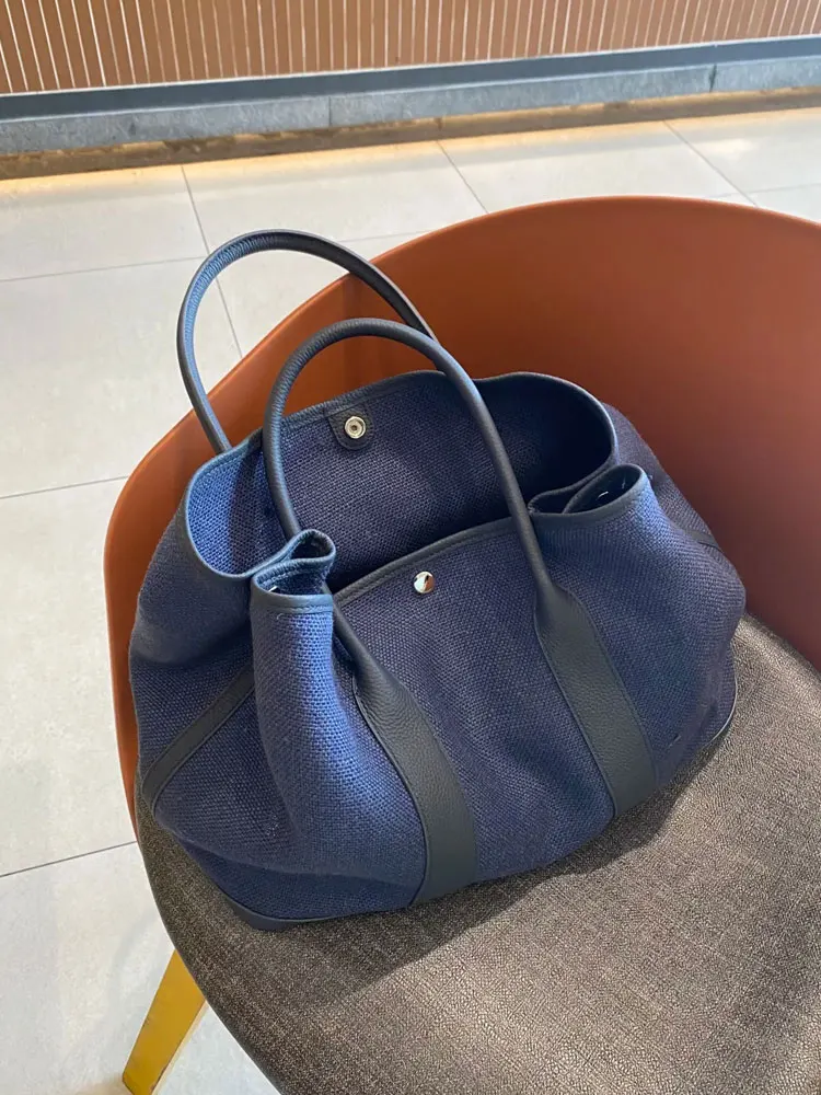 Blue Linen Canvas Tote Bag Women's 2026 New High-End Lightweight Luxury Commuting Garden Bag Summer Fashion Handbag
Blue Linen Canvas Tote Bag Women's 2026 New High-End Lightweight Luxury Commuting Garden Bag Summer Fashion Handbag