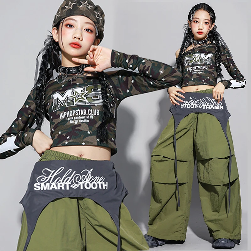 Джазовый наряд для девочек, детский костюм для танцев Kpop, камуфляжный укороченный топ, зеленые брюки, наряд для уличных танцев, уличная одежда AMY3123
Джазовый наряд для девочек, детский костюм для танцев Kpop, камуфляжный укороченный топ, зеленые брюки, наряд для уличных танцев, уличная одежда AMY3123