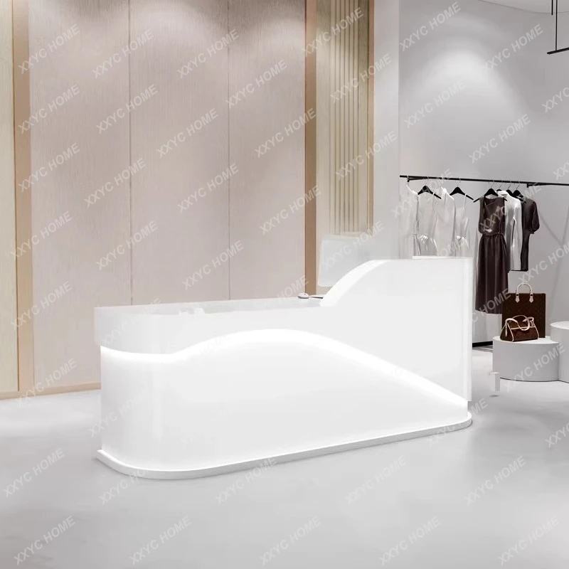 A Simple beauty salon reception desk, small clothing store front desk, women's clothing store cream-style lacquered bar counter
A Simple beauty salon reception desk, small clothing store front desk, women's clothing store cream-style lacquered bar counter