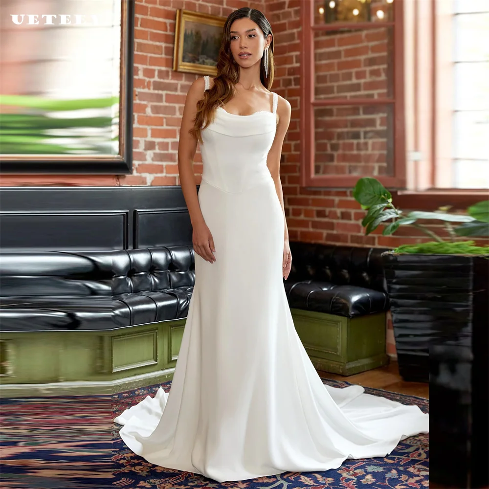 UETEEY Customized Sexy Cut Out Sleeveless Crepe Sleeveless Pleats Mermaid Wedding For Women Court Train Open Back Bridal Gown
UETEEY Customized Sexy Cut Out Sleeveless Crepe Sleeveless Pleats Mermaid Wedding For Women Court Train Open Back Bridal Gown