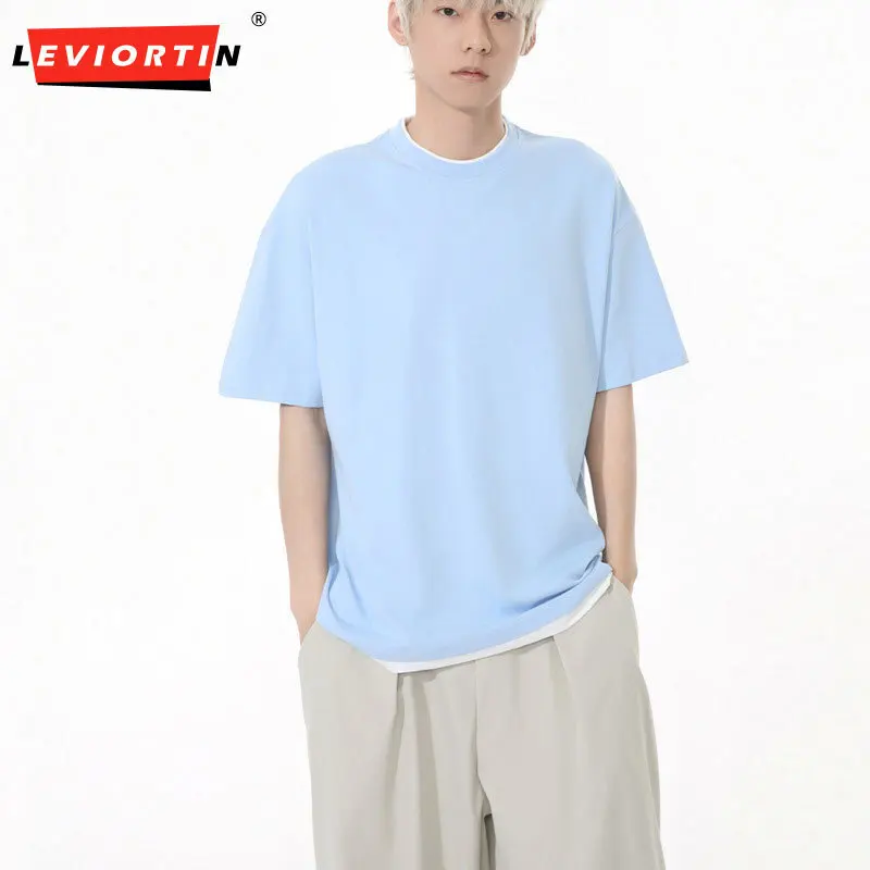 Men's summer new Korean version personalized color blocked fake two-piece round neck loose casual simple short sleeved T-shirt
Men's summer new Korean version personalized color blocked fake two-piece round neck loose casual simple short sleeved T-shirt