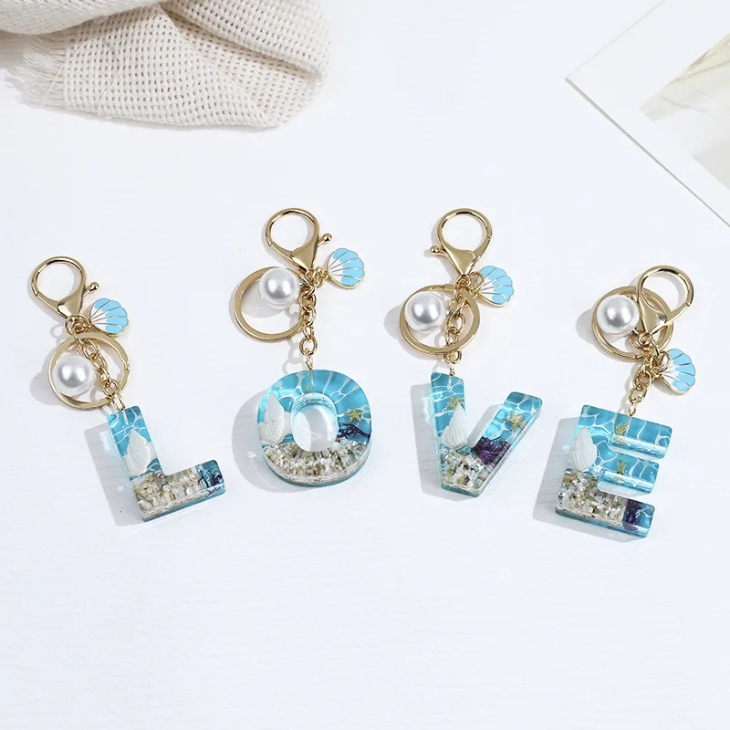 New Ocean Series Shell Letters 26 English Resin Letters Keychain European and American Popular Jewelry
New Ocean Series Shell Letters 26 English Resin Letters Keychain European and American Popular Jewelry