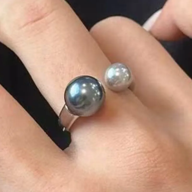 PANJBJ кольцо из стерлингового серебра 925 пробы с серым жемчугом для женщин, асимметричная классика, милое романтическое простое ювелирное изделие, подарок, дропшиппинг
PANJBJ кольцо из стерлингового серебра 925 пробы с серым жемчугом для женщин, асимметричная классика, милое романтическое простое ювелирное изделие, подарок, дропшиппинг