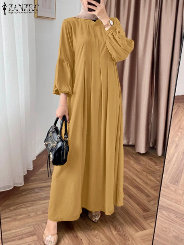 2025 ZANZEA Women Elegant Long Lantern Sleeve Muslim Abaya Islamic Hijab Dresses Fashion Pleated Sundress Maxi Robe Vestidos
2025 ZANZEA Women Elegant Long Lantern Sleeve Muslim Abaya Islamic Hijab Dresses Fashion Pleated Sundress Maxi Robe Vestidos