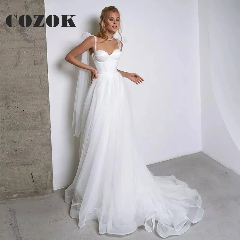 White Tulle Simple Wedding Dress Boho Bow Spaghetti Straps A Line Wedding Party Gowns Vestidos De Noiva Custom ZY21
White Tulle Simple Wedding Dress Boho Bow Spaghetti Straps A Line Wedding Party Gowns Vestidos De Noiva Custom ZY21
