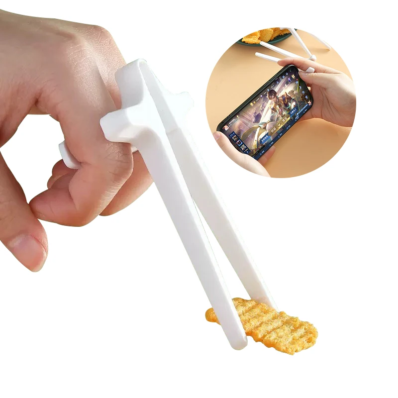 Free-Hands Snack Chopsticks Play Games Finger Chopsticks Lazy Assistant Clip Snacks Not Dirty Hand Rings
Free-Hands Snack Chopsticks Play Games Finger Chopsticks Lazy Assistant Clip Snacks Not Dirty Hand Rings
