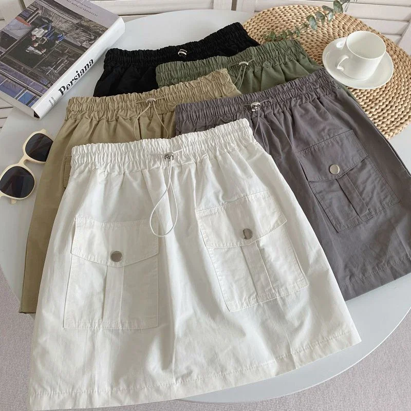 Y2K Women Cargo Skirt Summer Casual Drawstring Loose A Line Skirt Korean High Waist Baggy Pocket Female Solid Mini Skirts
Y2K Women Cargo Skirt Summer Casual Drawstring Loose A Line Skirt Korean High Waist Baggy Pocket Female Solid Mini Skirts