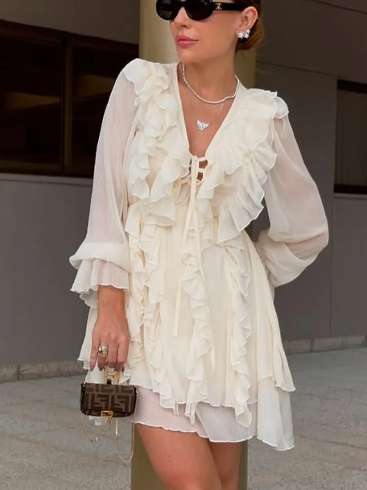 Women Chic Flared Sleeves Ruffle Mini Dress Sexy V-neck Lace-up See Through High Waist A-line Dresses Lady 2026 Vacation Robes
Women Chic Flared Sleeves Ruffle Mini Dress Sexy V-neck Lace-up See Through High Waist A-line Dresses Lady 2026 Vacation Robes
