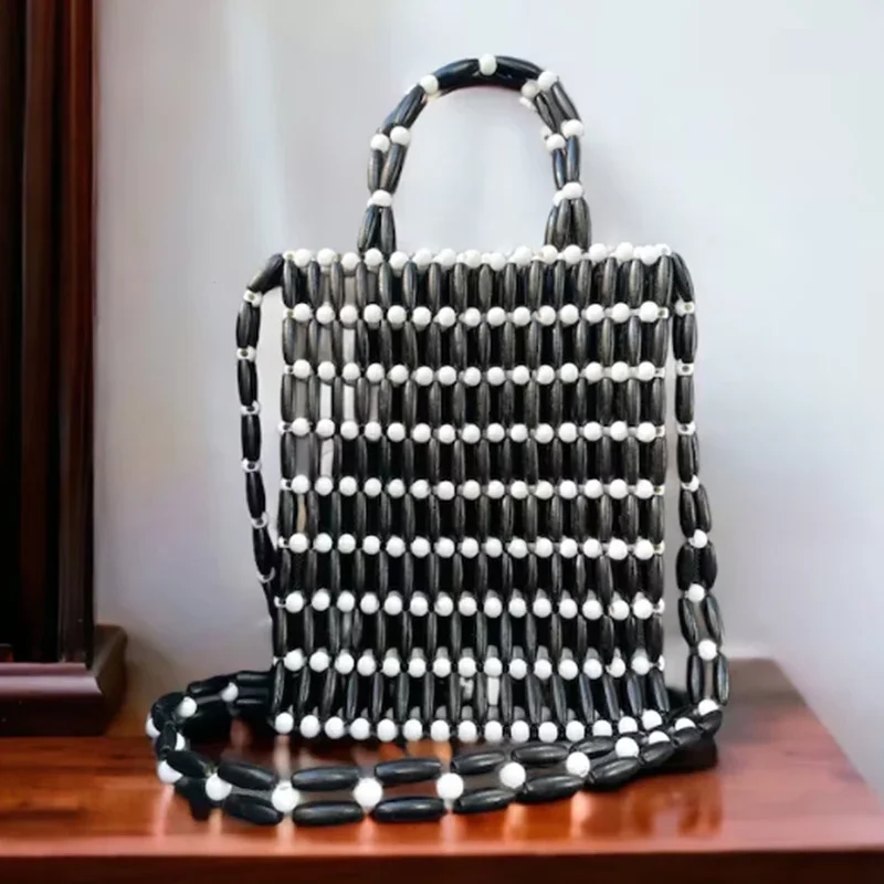 New Casual Minimalist Black White Contrasting Wooden Bead Made Handbag Retro Beach Vacation Crossbody Bag Shopping Tote Bags
New Casual Minimalist Black White Contrasting Wooden Bead Made Handbag Retro Beach Vacation Crossbody Bag Shopping Tote Bags