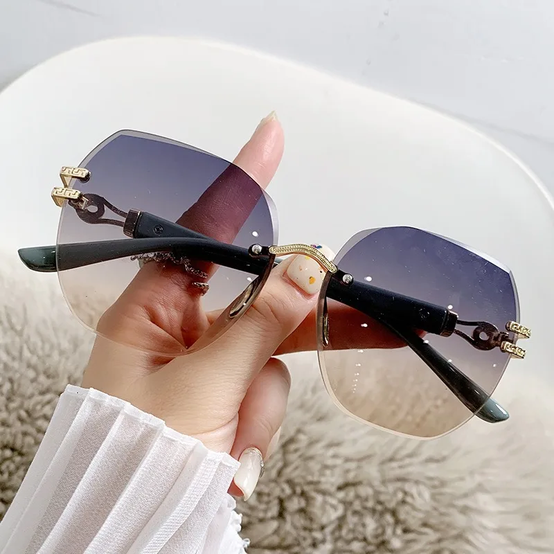 Gradient Tea Trendy Women Sunglasses Oversize Rimless Retro Shades for Decoration Driving UV Protection Sun Glasses
Gradient Tea Trendy Women Sunglasses Oversize Rimless Retro Shades for Decoration Driving UV Protection Sun Glasses