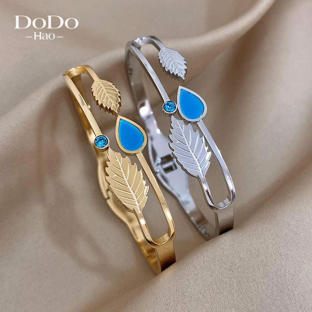 DODOHAO Simple Temperament Trendy Leaf Blue Enamel Water Drop Bangles Bracelets for Women Man Stainless Steel Gold Color Jewelry
DODOHAO Simple Temperament Trendy Leaf Blue Enamel Water Drop Bangles Bracelets for Women Man Stainless Steel Gold Color Jewelry