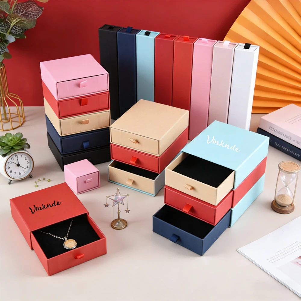 50pcs Jewelry Organizer Display Boxes Travel Jewellry Gift Case Boxes Earrings Necklace Ring Portable Box Custom Logo 7x7x2.5cm
50pcs Jewelry Organizer Display Boxes Travel Jewellry Gift Case Boxes Earrings Necklace Ring Portable Box Custom Logo 7x7x2.5cm