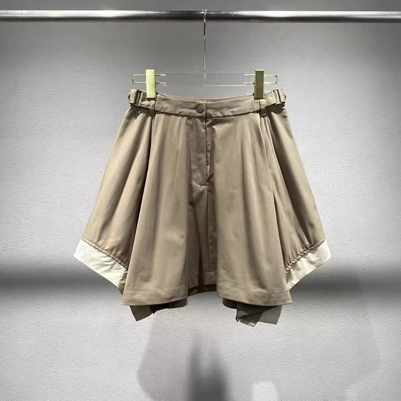 The 2025 summer new French solid-color versatile casual short skirt with an irregular skirt hem and an A-line skirt
The 2025 summer new French solid-color versatile casual short skirt with an irregular skirt hem and an A-line skirt