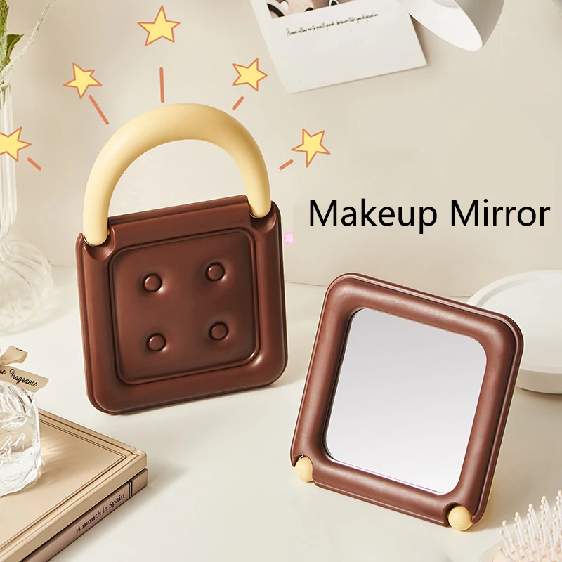 New Portable Foldable Makeup Mirror Girl Desktop Mirrors for Home Student Dormitory Cute Chocolate Biscuit Handbag Design Mirror
New Portable Foldable Makeup Mirror Girl Desktop Mirrors for Home Student Dormitory Cute Chocolate Biscuit Handbag Design Mirror