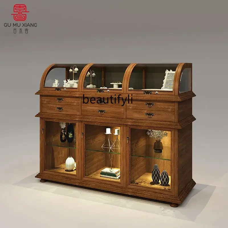 Ancient Muxiang retro jewelry display cabinet, transparent display jewelry curved glass high cabinet customization
Ancient Muxiang retro jewelry display cabinet, transparent display jewelry curved glass high cabinet customization