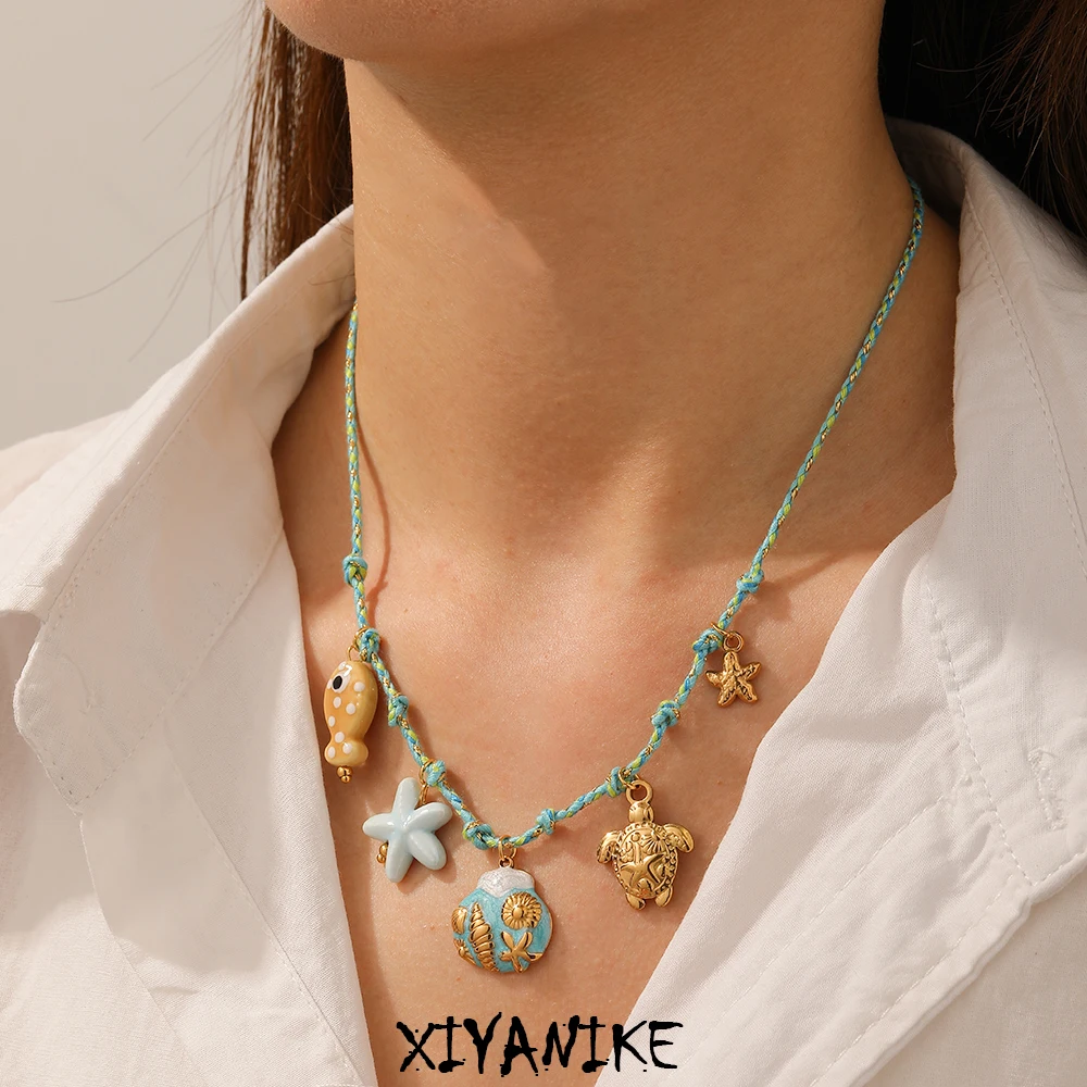 XIYANIKE 316L Stainless Steel Blue Rope Chain Cute Animals Starfish Tortoise Shell Fossil Design Necklace Women trend Neck Chain
XIYANIKE 316L Stainless Steel Blue Rope Chain Cute Animals Starfish Tortoise Shell Fossil Design Necklace Women trend Neck Chain