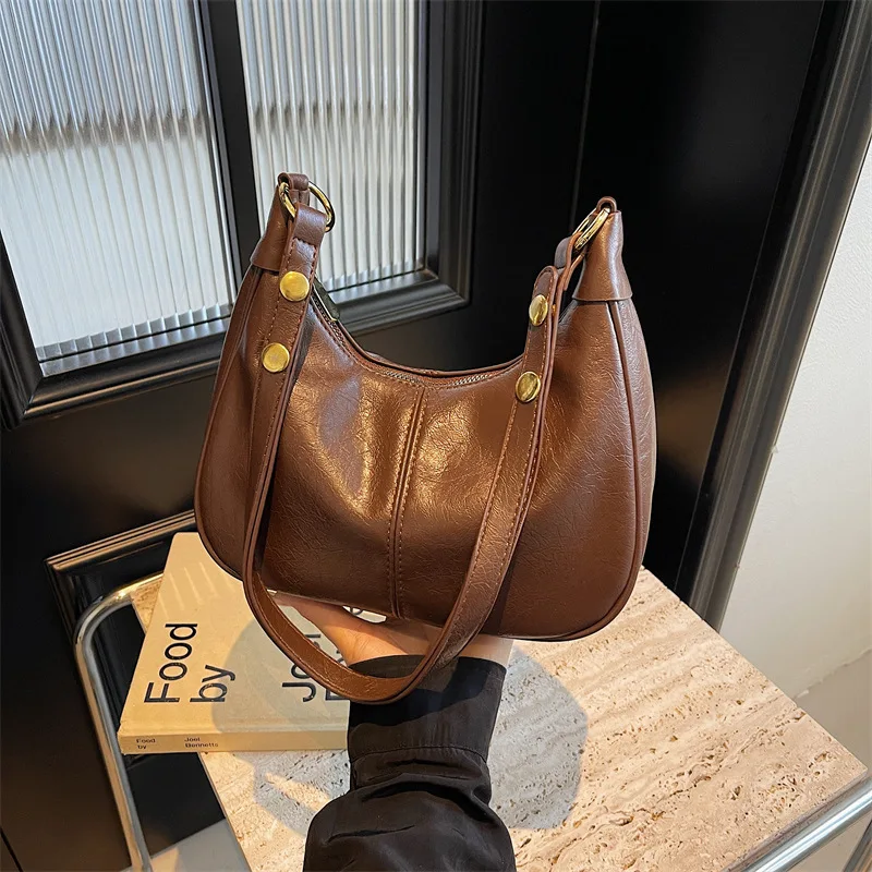 New 2025 Fashion Retro Women's Bag - Commuter Shoulder Underarm, Versatile Crossbody Dumpling Bag Style
New 2025 Fashion Retro Women's Bag - Commuter Shoulder Underarm, Versatile Crossbody Dumpling Bag Style