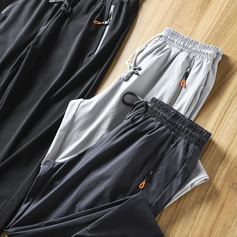 Men's Sporty Casual Loose Fit Long Pants Breathable Quick Dry Spring Summer New Style Straight Leg Thin Sweatpants
Men's Sporty Casual Loose Fit Long Pants Breathable Quick Dry Spring Summer New Style Straight Leg Thin Sweatpants
