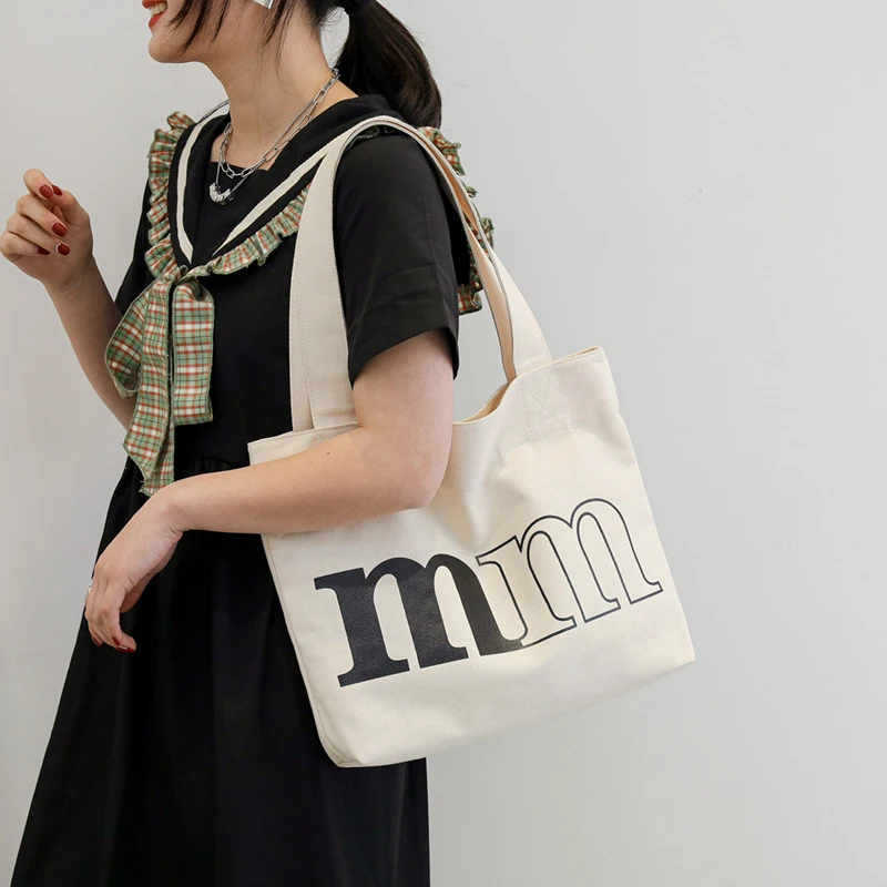 2026 New Women's Canvas Letter Shoulder Bag Casual Large Capacity Commuter Tote for College Students School Handbag
2026 New Women's Canvas Letter Shoulder Bag Casual Large Capacity Commuter Tote for College Students School Handbag