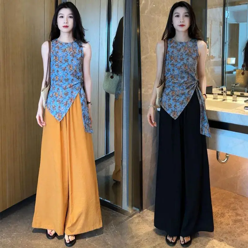 Fashion suit women's 2026 summer new blue printed sleeveless top casual wide leg pants two-piece set
Fashion suit women's 2026 summer new blue printed sleeveless top casual wide leg pants two-piece set