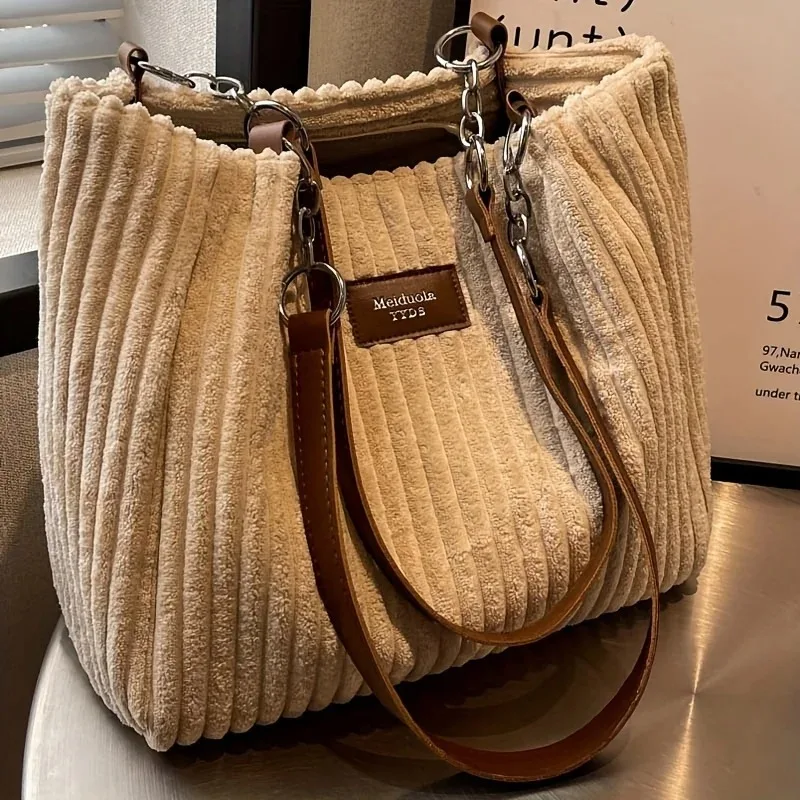 Stylish Corduroy Tote Bag for Women, Large Capacity Plush Shoulder Bag, Versatile Commuter & Travel Bag.
Stylish Corduroy Tote Bag for Women, Large Capacity Plush Shoulder Bag, Versatile Commuter & Travel Bag.