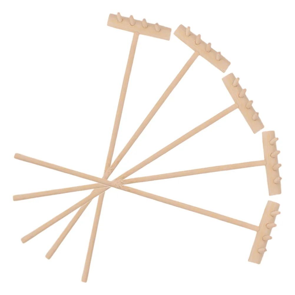 Набор из 5 миниатюрных грабель для песка для настольного дзен-сада, портативные грабли для песочницы, декор, креативные садовые аксессуары в деревенском стиле
Набор из 5 миниатюрных грабель для песка для настольного дзен-сада, портативные грабли для песочницы, декор, креативные садовые аксессуары в деревенском стиле