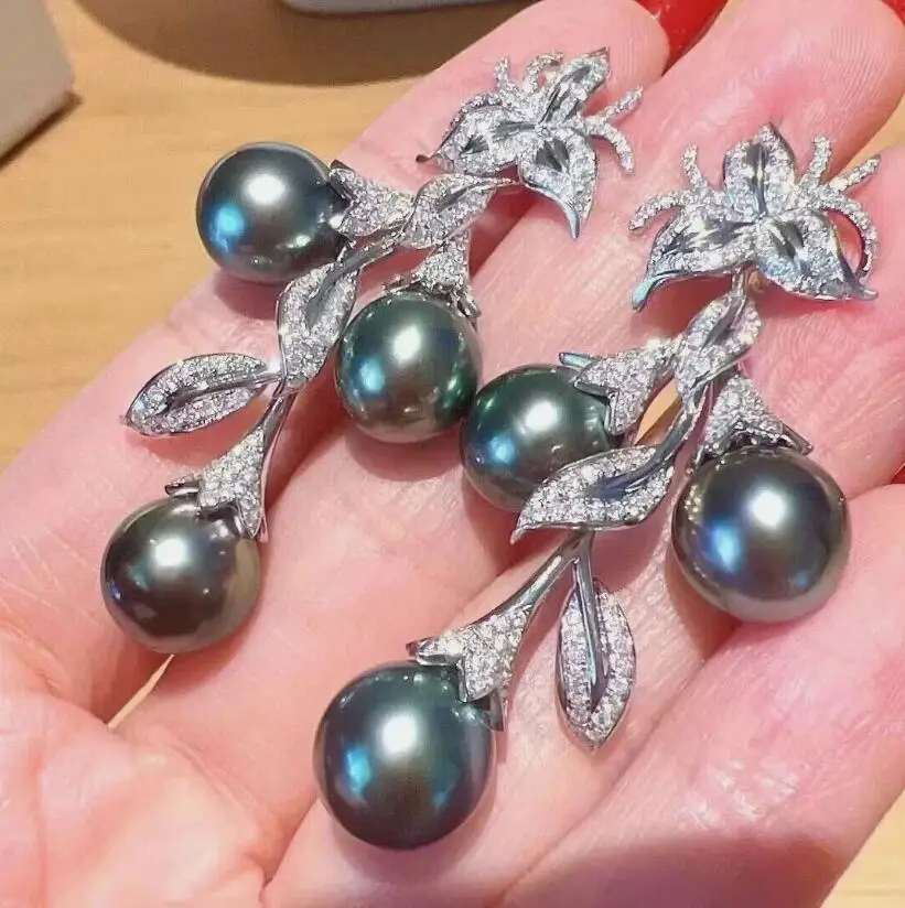 stunning pair of 8-9mm tahitian black green pearl dangle earring 925s
stunning pair of 8-9mm tahitian black green pearl dangle earring 925s