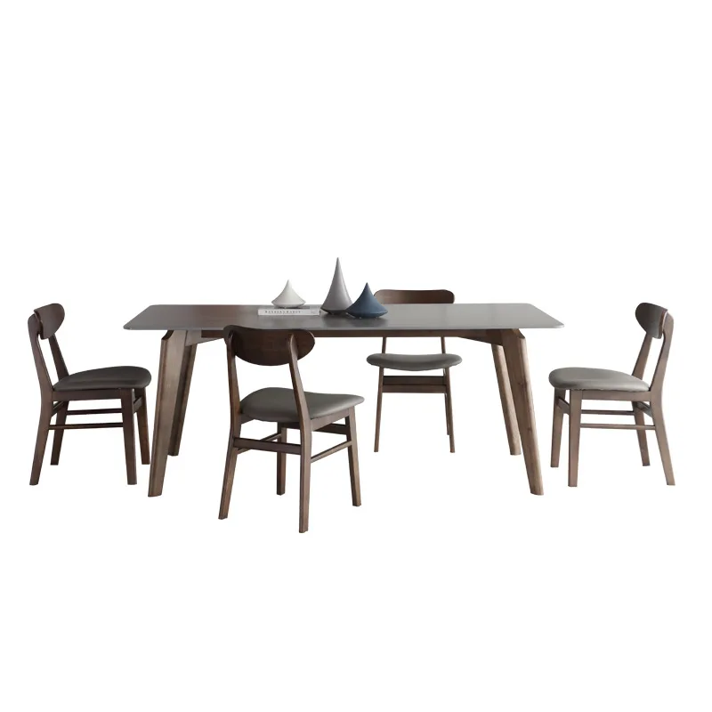 Обеденный стол из шифера, роскошь в скандинавском стиле, комбинация стола и стула из массива дерева.
Обеденный стол из шифера, роскошь в скандинавском стиле, комбинация стола и стула из массива дерева.