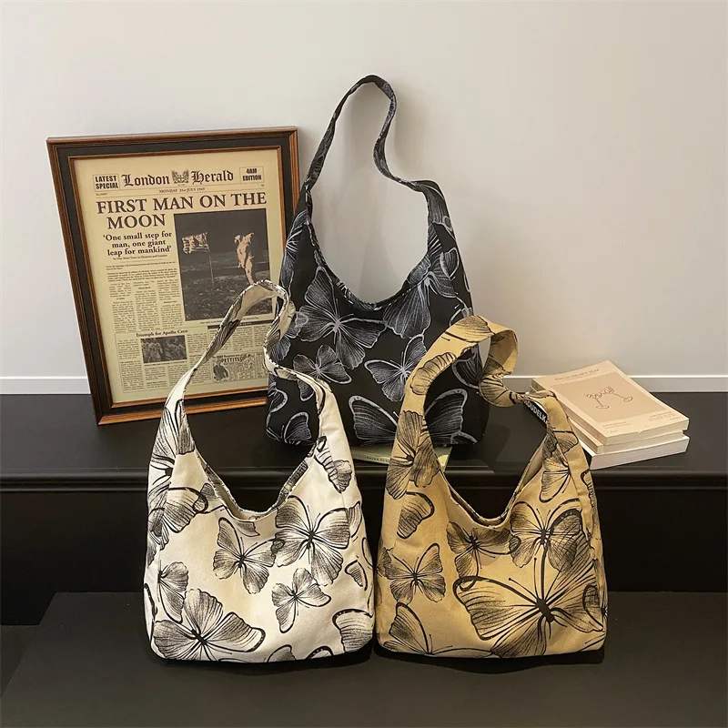 Новая женская сумка через плечо: модная и высококачественная холщовая женская сумка, повседневная универсальная сумка для покупок и хранения вещей.
Новая женская сумка через плечо: модная и высококачественная холщовая женская сумка, повседневная универсальная сумка для покупок и хранения вещей.