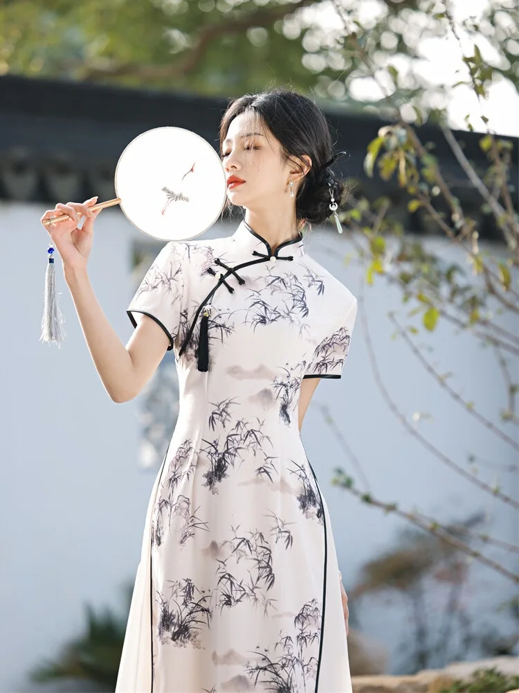 Young Mom's New Chinese Style Long Qipao Dress Tea Ceremony Server Uniform Spring Summer High Slit Short Sleeve Floral Pattern
Young Mom's New Chinese Style Long Qipao Dress Tea Ceremony Server Uniform Spring Summer High Slit Short Sleeve Floral Pattern
