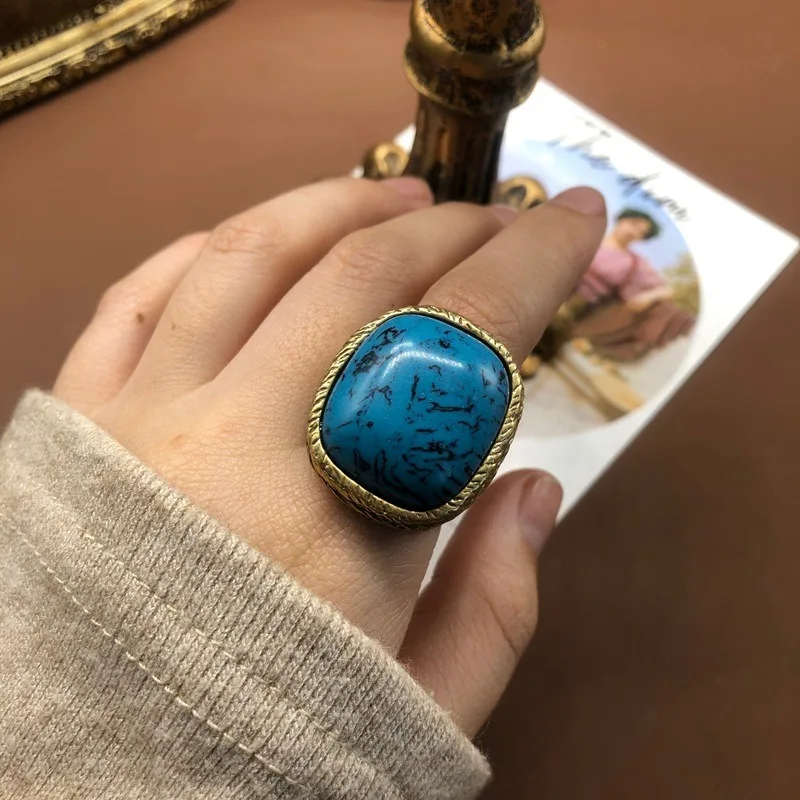 Blue Turquoise Powder Spar Rose Purple Stone Medieval Ring Niche Light Luxury Fashion Retro Copper Wide Version Ring
Blue Turquoise Powder Spar Rose Purple Stone Medieval Ring Niche Light Luxury Fashion Retro Copper Wide Version Ring