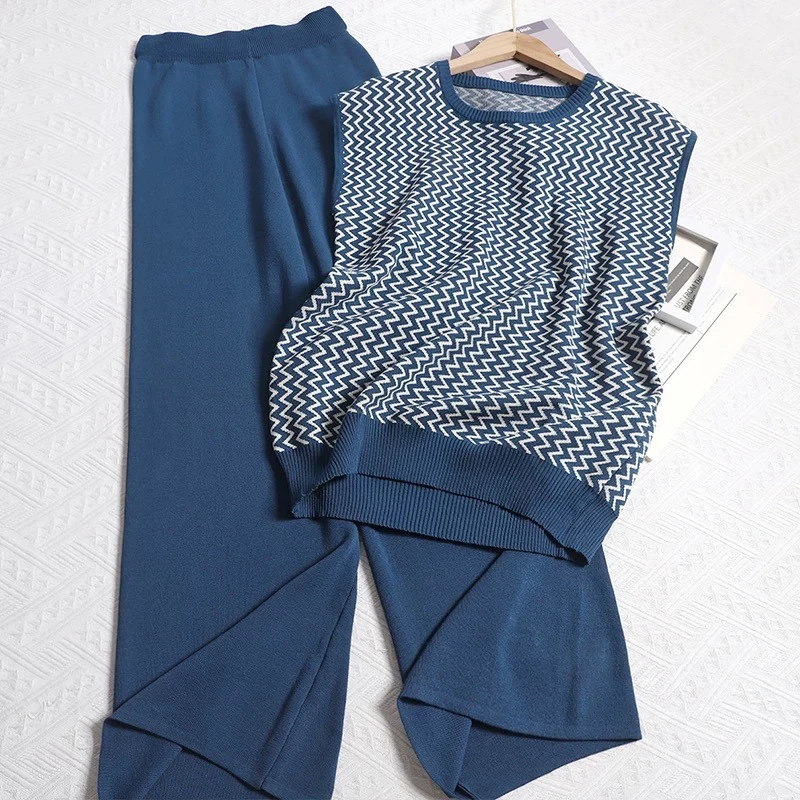 Korean style fashion knitted set women's spring design sense tied long sleeved sweater high waisted loose wide leg pants
Korean style fashion knitted set women's spring design sense tied long sleeved sweater high waisted loose wide leg pants