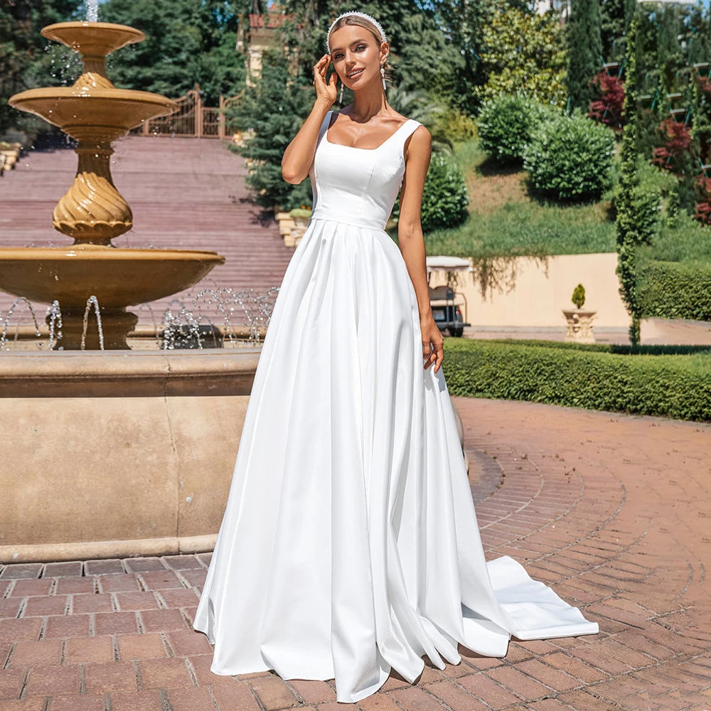 Elegant Wedding Dresses for Bride 2023 A Line Ivory Tank Simple Gowns Long Women Sleeveless Belt Princess Bridal Dress
Elegant Wedding Dresses for Bride 2023 A Line Ivory Tank Simple Gowns Long Women Sleeveless Belt Princess Bridal Dress