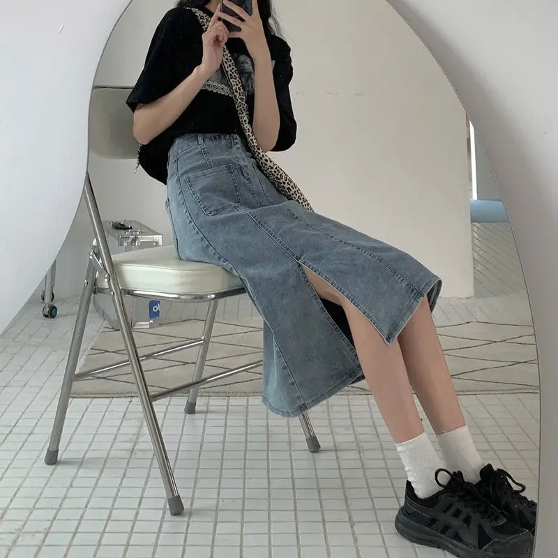 Женские юбки 2021, летние новые корейские модные синие джинсовые эластичные трапециевидные юбки с высокой талией и разрезом, повседневные однотонные универсальные брюки с карманами
Женские юбки 2021, летние новые корейские модные синие джинсовые эластичные трапециевидные юбки с высокой талией и разрезом, повседневные однотонные универсальные брюки с карманами