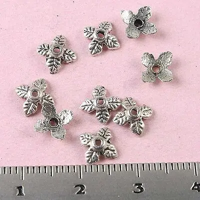 200pcs 5.7mm tibetan silver flower charms findings h1586
200pcs 5.7mm tibetan silver flower charms findings h1586