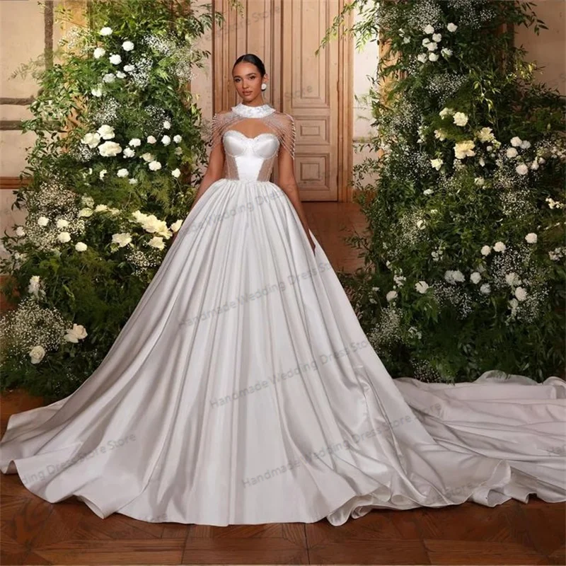 Luxury Crystals Beading Wedding Dress Sexy Sleeveless Satin A Line Bridal Gown Customized Beach Garden Long robe de mariée
Luxury Crystals Beading Wedding Dress Sexy Sleeveless Satin A Line Bridal Gown Customized Beach Garden Long robe de mariée