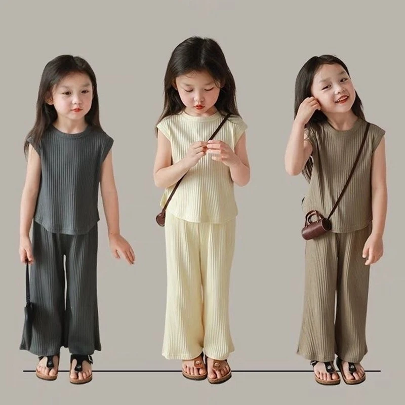 Summer Sleeveless Baby Girls Clothes Sets Ice Silk Tops Pants 2Pcs Kids Sets Solid Color Loose Fashion Children Two-Piece Suit
Summer Sleeveless Baby Girls Clothes Sets Ice Silk Tops Pants 2Pcs Kids Sets Solid Color Loose Fashion Children Two-Piece Suit