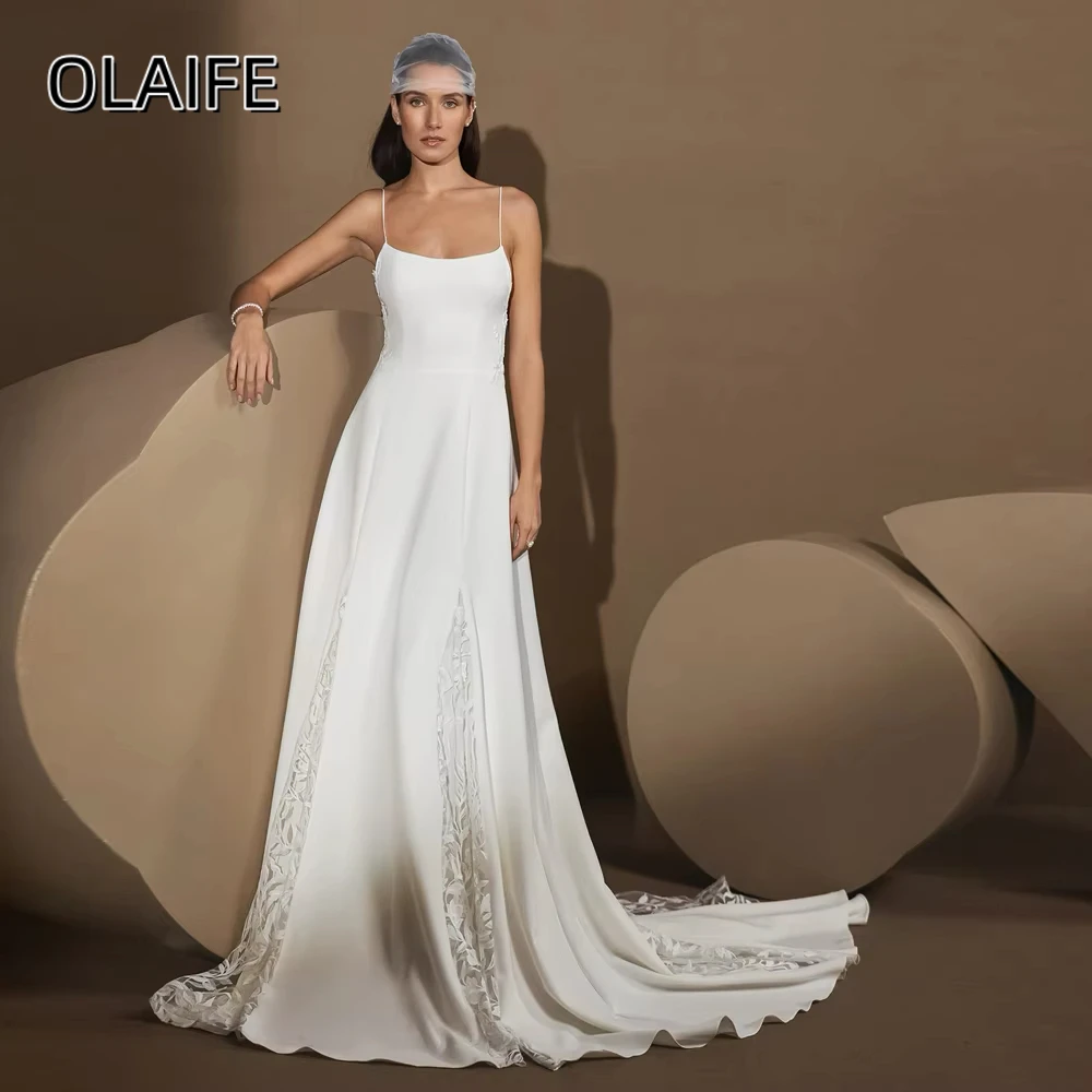 Очаровательное свадебное платье А-силуэта на тонких бретелях с открытой спиной, шлейфом и атласными кружевными аппликациями, индивидуальный пошив
Очаровательное свадебное платье А-силуэта на тонких бретелях с открытой спиной, шлейфом и атласными кружевными аппликациями, индивидуальный пошив