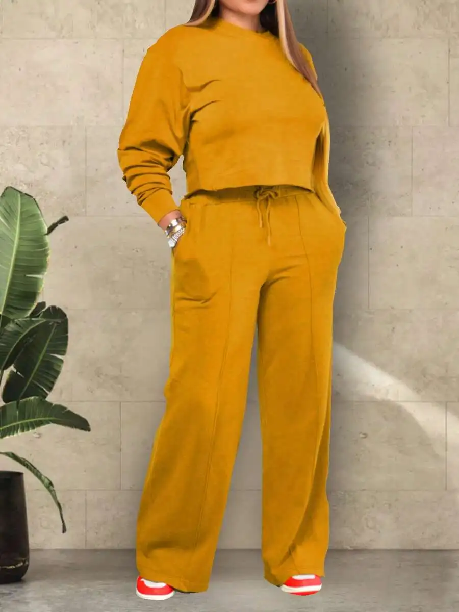 Желтый комплект для отдыха из 2 предметов: укороченный топ и брюки с широкими штанинами
Желтый комплект для отдыха из 2 предметов: укороченный топ и брюки с широкими штанинами