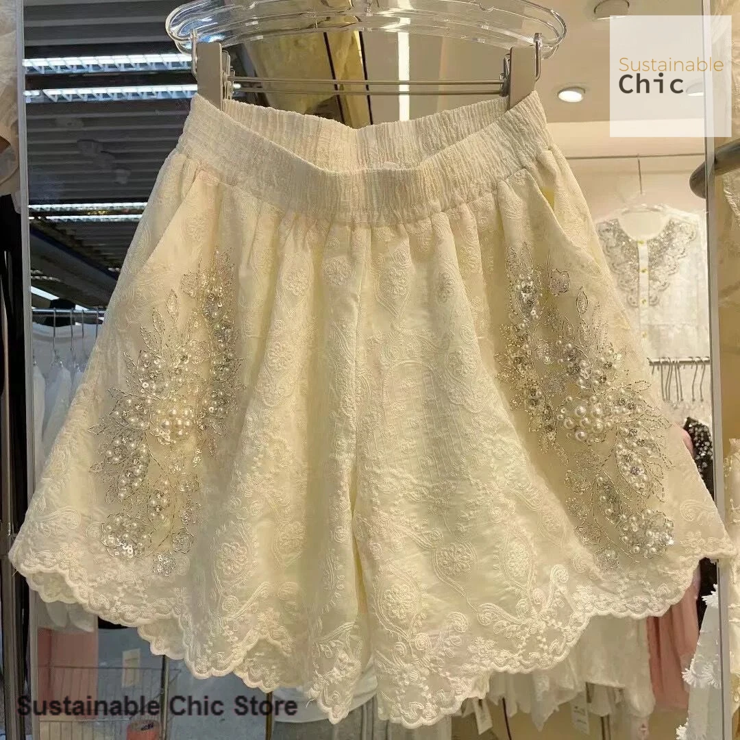 French style fashion heavy industry beaded lace casual shorts women's summer new high waist loose slim lace wide leg hot pants
French style fashion heavy industry beaded lace casual shorts women's summer new high waist loose slim lace wide leg hot pants