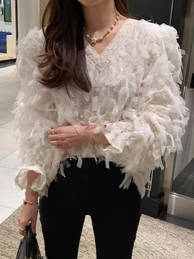Korea Chic Autumn Winter New Exotic V-neck Embroidery Crochet Loose Tassel Design Puff Sleeve Shirt Top Woman
Korea Chic Autumn Winter New Exotic V-neck Embroidery Crochet Loose Tassel Design Puff Sleeve Shirt Top Woman