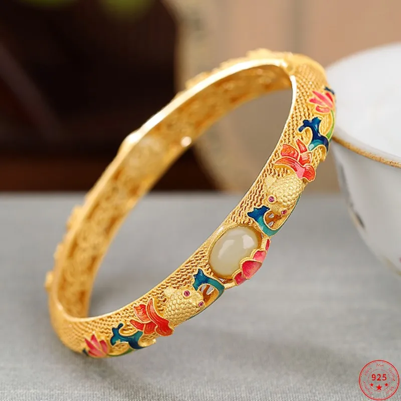 Genuine S925 Sterling Silver Bracelet for Women New Fashion Gold Plated Hotan Jade Enamel Goldfish Lotus Hollow Bangle Jewelry
Genuine S925 Sterling Silver Bracelet for Women New Fashion Gold Plated Hotan Jade Enamel Goldfish Lotus Hollow Bangle Jewelry