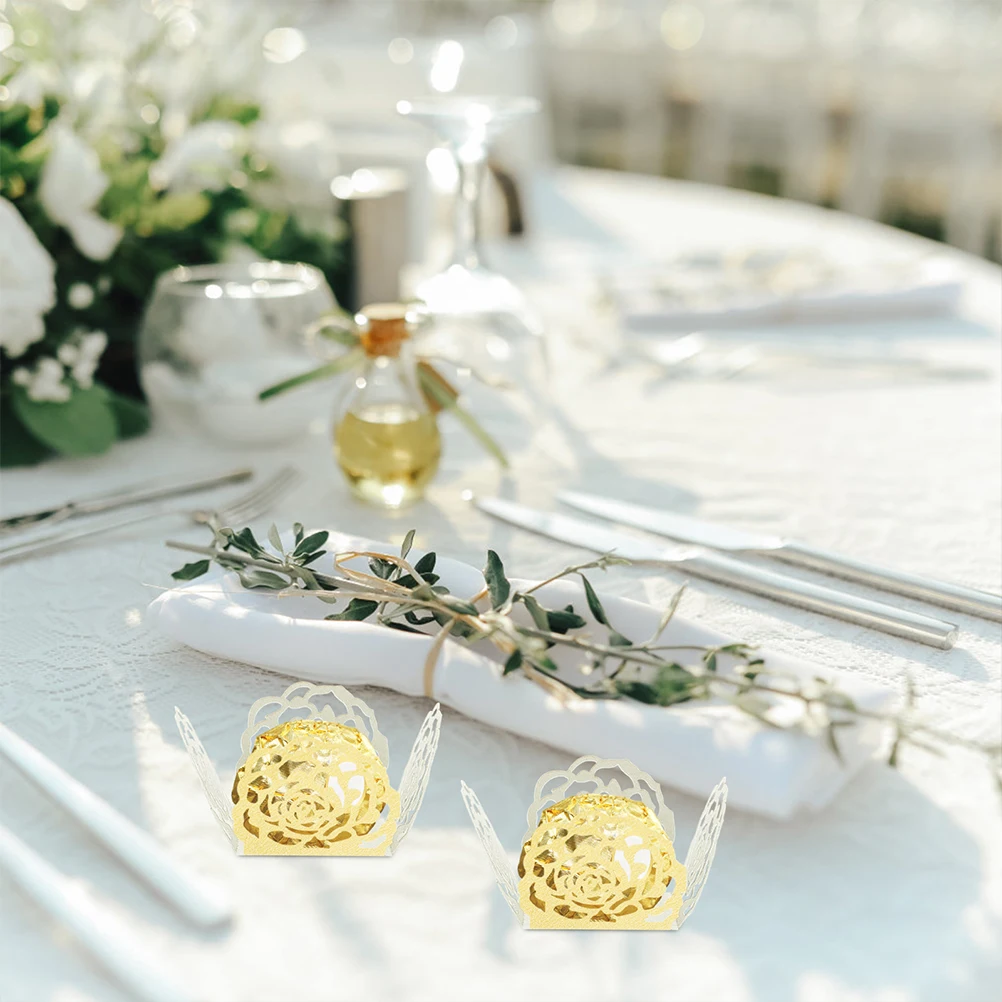 50Pcs Chocolate Paper Wrappers Hollow-Out Flower Design Candy Truffle Cups Practical Party Wedding Use Chocolate Wrappers 
50Pcs Chocolate Paper Wrappers Hollow-Out Flower Design Candy Truffle Cups Practical Party Wedding Use Chocolate Wrappers