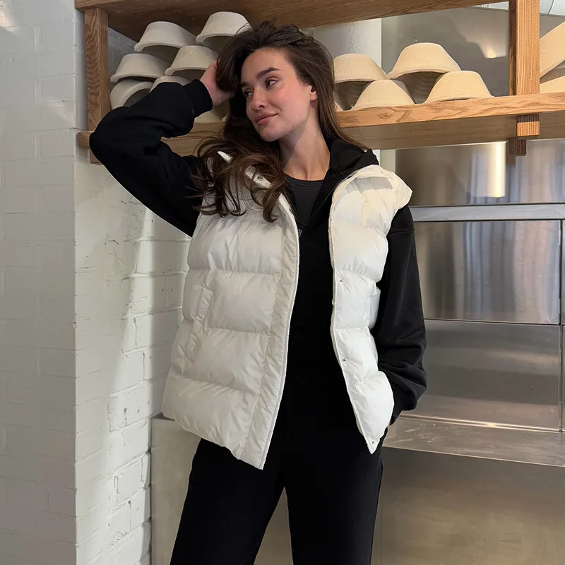 Женская одежда 2025, новая зимняя милая и свежая женская хлопковая куртка без рукавов с воротником-стойкой и карманом 
Женская одежда 2025, новая зимняя милая и свежая женская хлопковая куртка без рукавов с воротником-стойкой и карманом