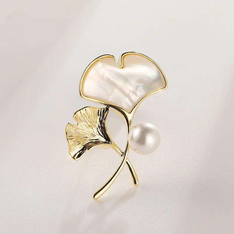 Брошь из натуральной ракушки с жемчугом, брошь в форме листа гинкго для женщин, винтажные жемчужные броши, аксессуары для украшений
Брошь из натуральной ракушки с жемчугом, брошь в форме листа гинкго для женщин, винтажные жемчужные броши, аксессуары для украшений