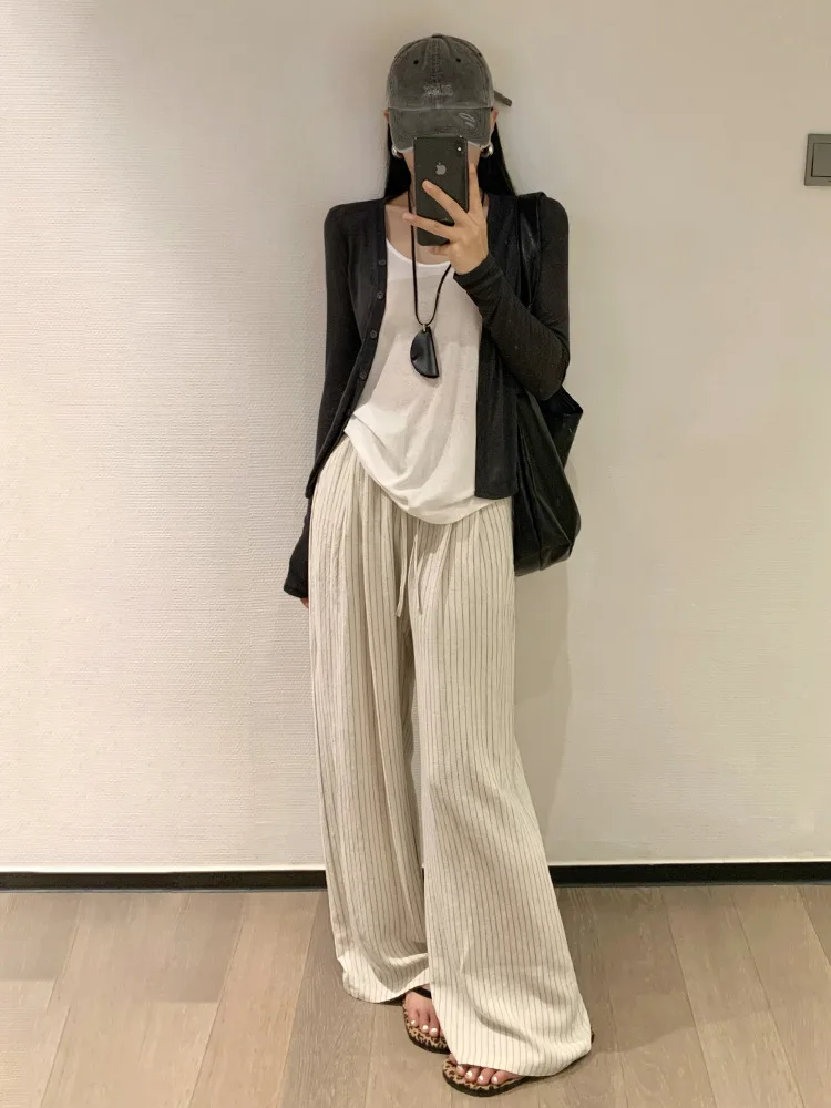 Широкие брюки с кисточками и эластичной резинкой на талии, прямые женские зимние бархатные прямые брюки, элегантные женские городские профессиональные плюшевые подкладки 2025
Широкие брюки с кисточками и эластичной резинкой на талии, прямые женские зимние бархатные прямые брюки, элегантные женские городские профессиональные плюшевые подкладки 2025